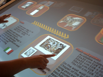 Figure 1: VIDIFACE interactive bookshop, a tabletop multi-user natural interaction system.